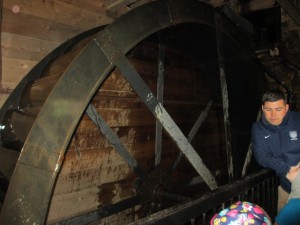 Mr. Neil telling us about the water wheel.