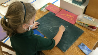 Student Working in Classroom