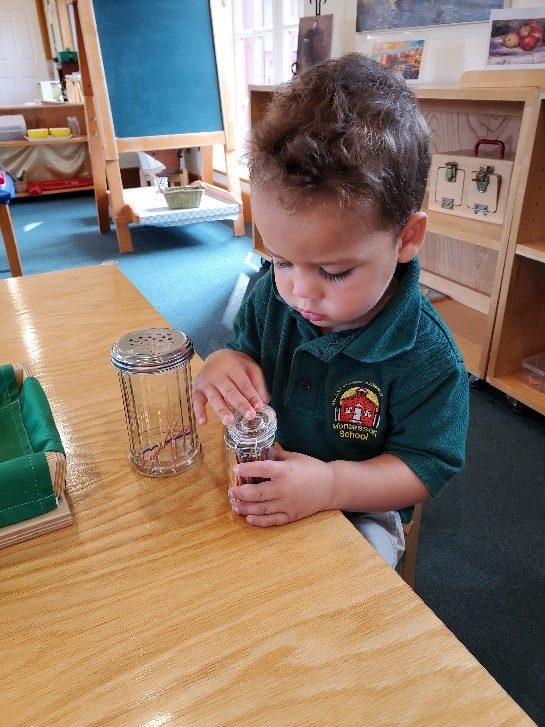 Toddlers working on fine motor skills