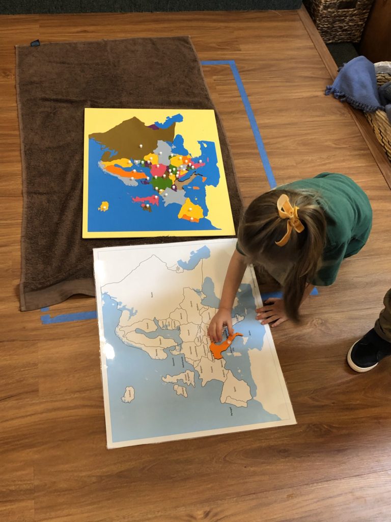 Child Looking at Map