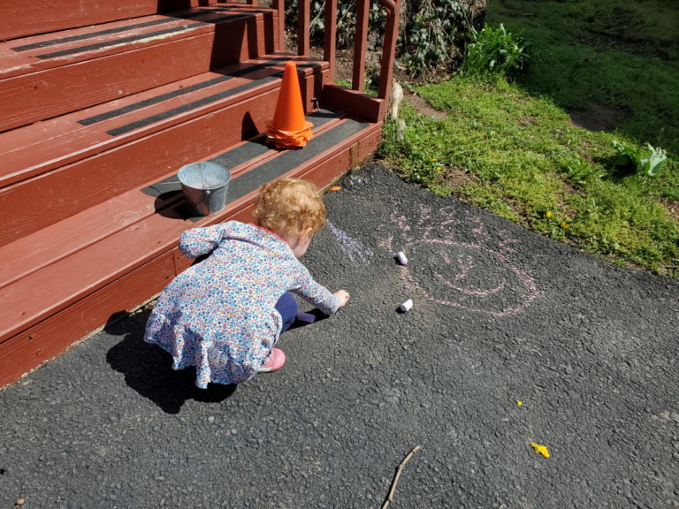 Child Using Sidewalk Chalk