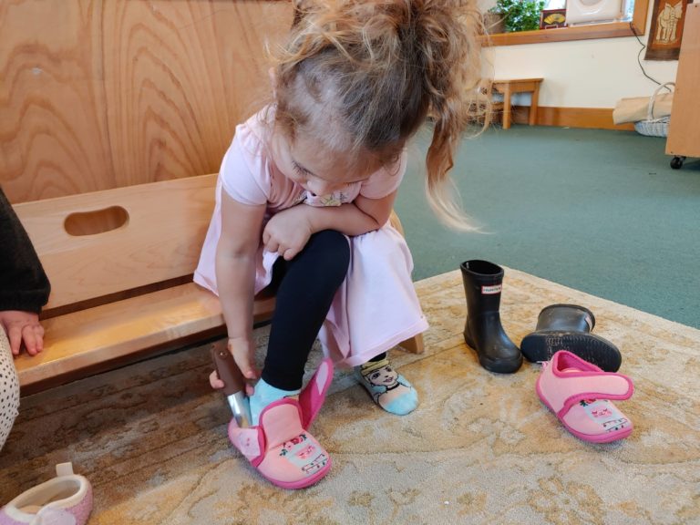 Child Using Shoe Horn